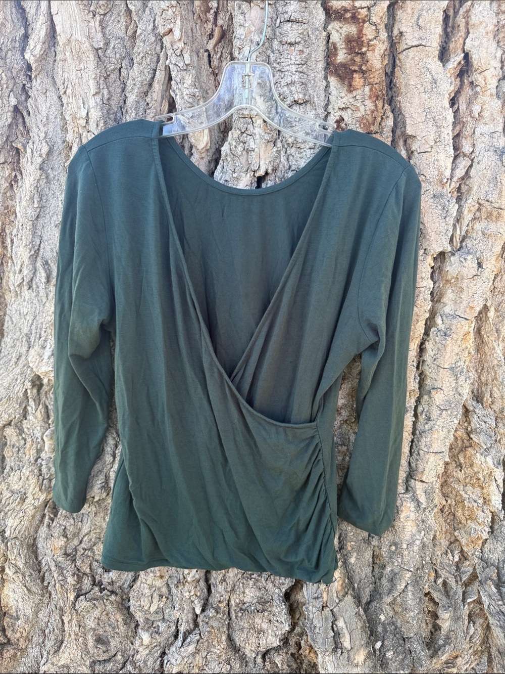 Encircled dark green faux wrap top made in Canada